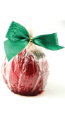Old fashioned red candy apples in Cello wrap with gold twist ties and satin bow.